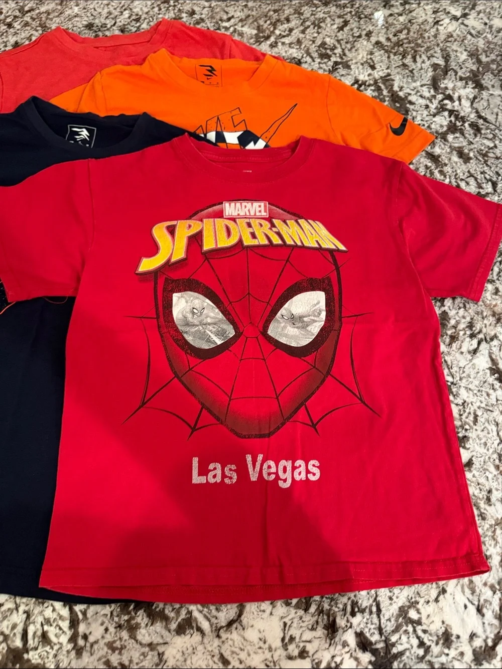 (4) T-shirts. 10/12 size. Nike, Marvel & Cat n Jack